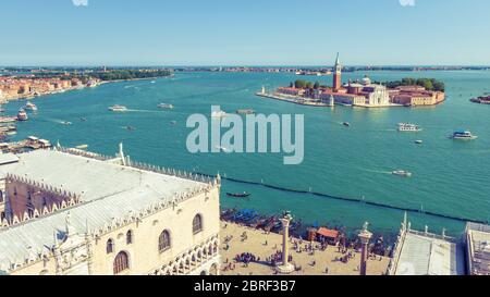 Aerial panoramic view of Venice, Italy. Piazza San Marco, or St Mark`s Square, with Doge`s Palace and seafront. Island of San Giorgio Maggiore in the Stock Photo